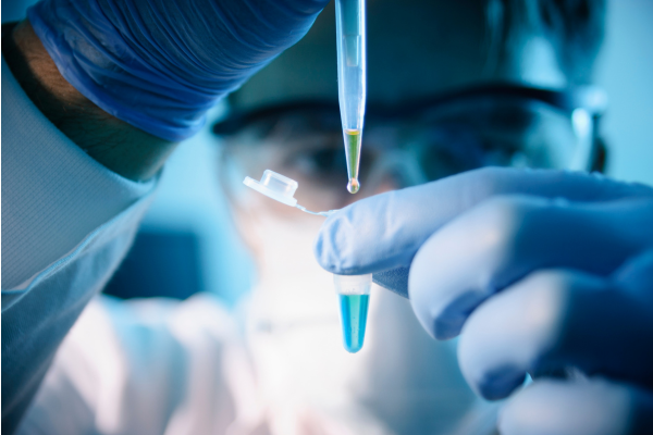 Scientists conducting pharmaceutical research in high-tech laboratory setting